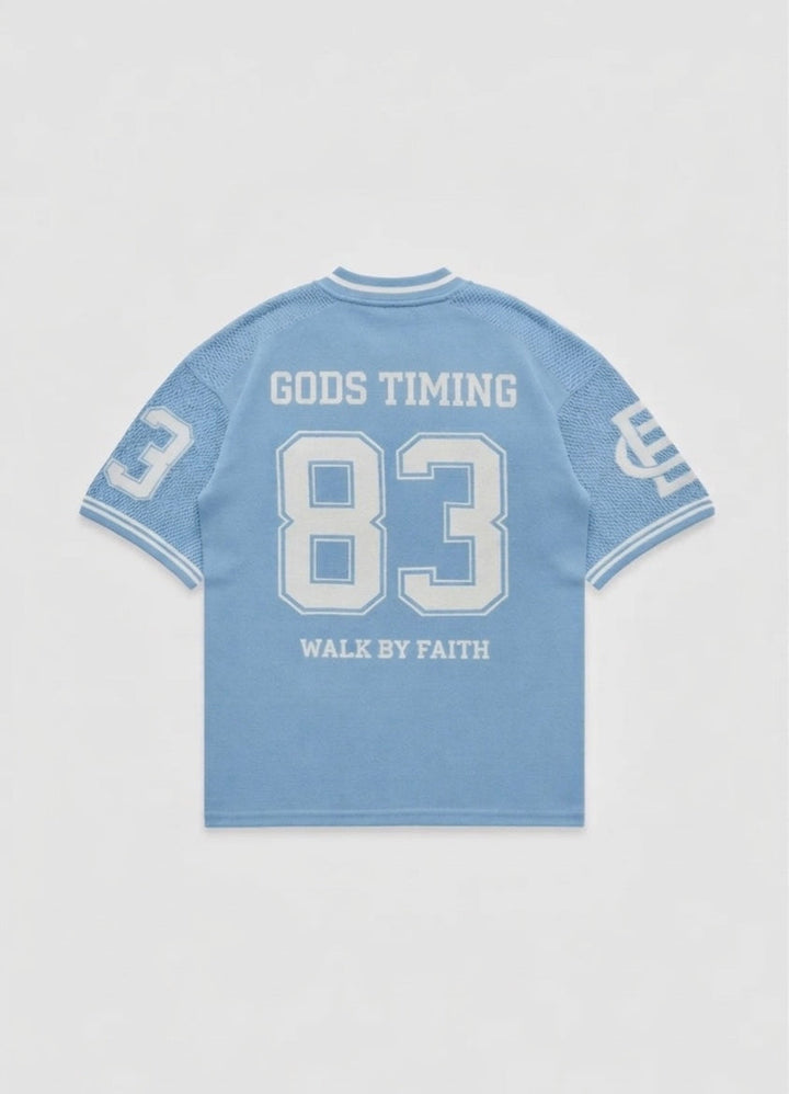 Back view of Benir Clothing light blue knit jersey featuring the number 83 and God&